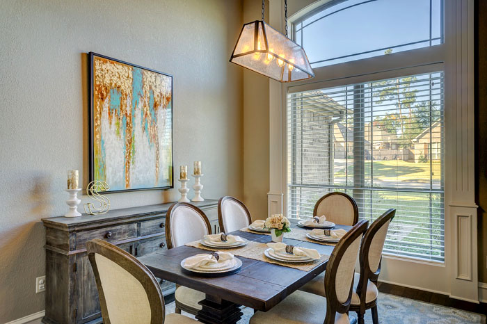 Transom Window above dining room windows of a traditional home